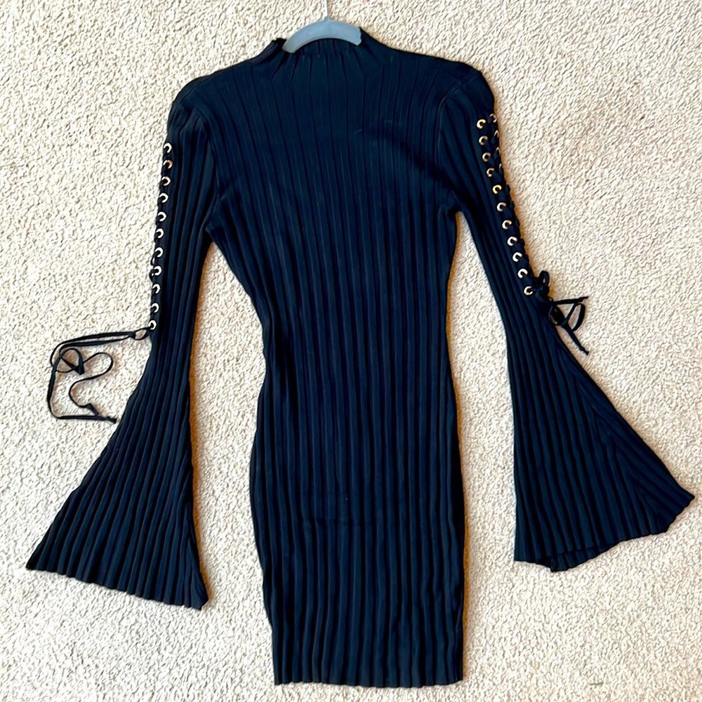 Beautiful Fashion Nova dress worn once. This dress is super cute and sexy!